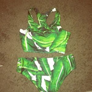 Swim suit with open sides on the top and bottom